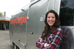 Erika Romero '14 poses with the StoryCorps Mobile Tour.