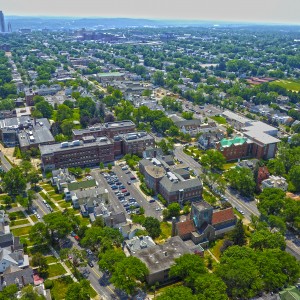 Aerial view of campus and the city of Albany skyline.