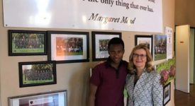 President Carolyn J. Stefanco with student at the African Leadership Academy.