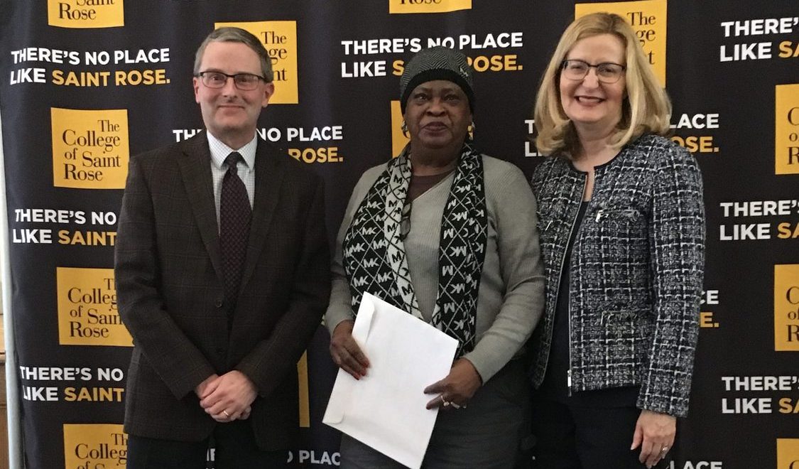 Roberta Smith, custodian, who was recognized for 35 years of service to the College, with Associate Vice President for Human Resources and Risk Management Jeffrey Knapp and Saint Rose President Carolyn J. Stefanco.
