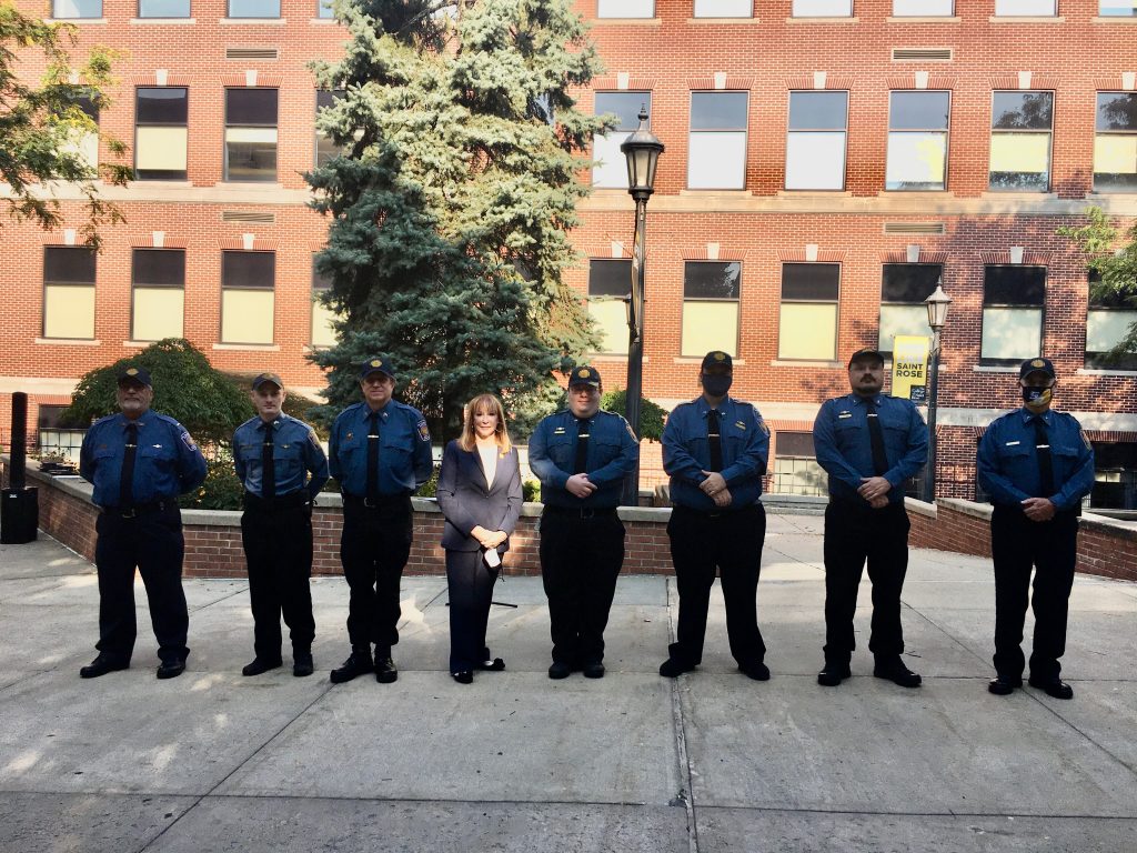 Saint Rose President Marcia White with the security officers who recently completed training