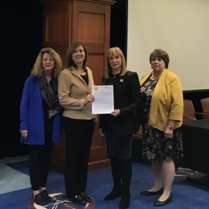 Saint Rose President Marcia J. White and Albany Law School President and Dean Alicia Ouellette, J.D. holding MOU