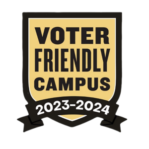 Voter Friendly Campus 2023-2024 emblem black writing on pale yellow shield with black ribbon on the bottom
