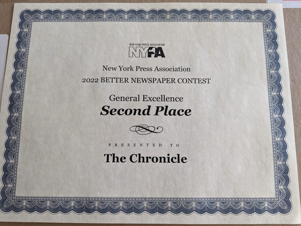 A photo of an award certificate for the Saint Rose Chronicle. 